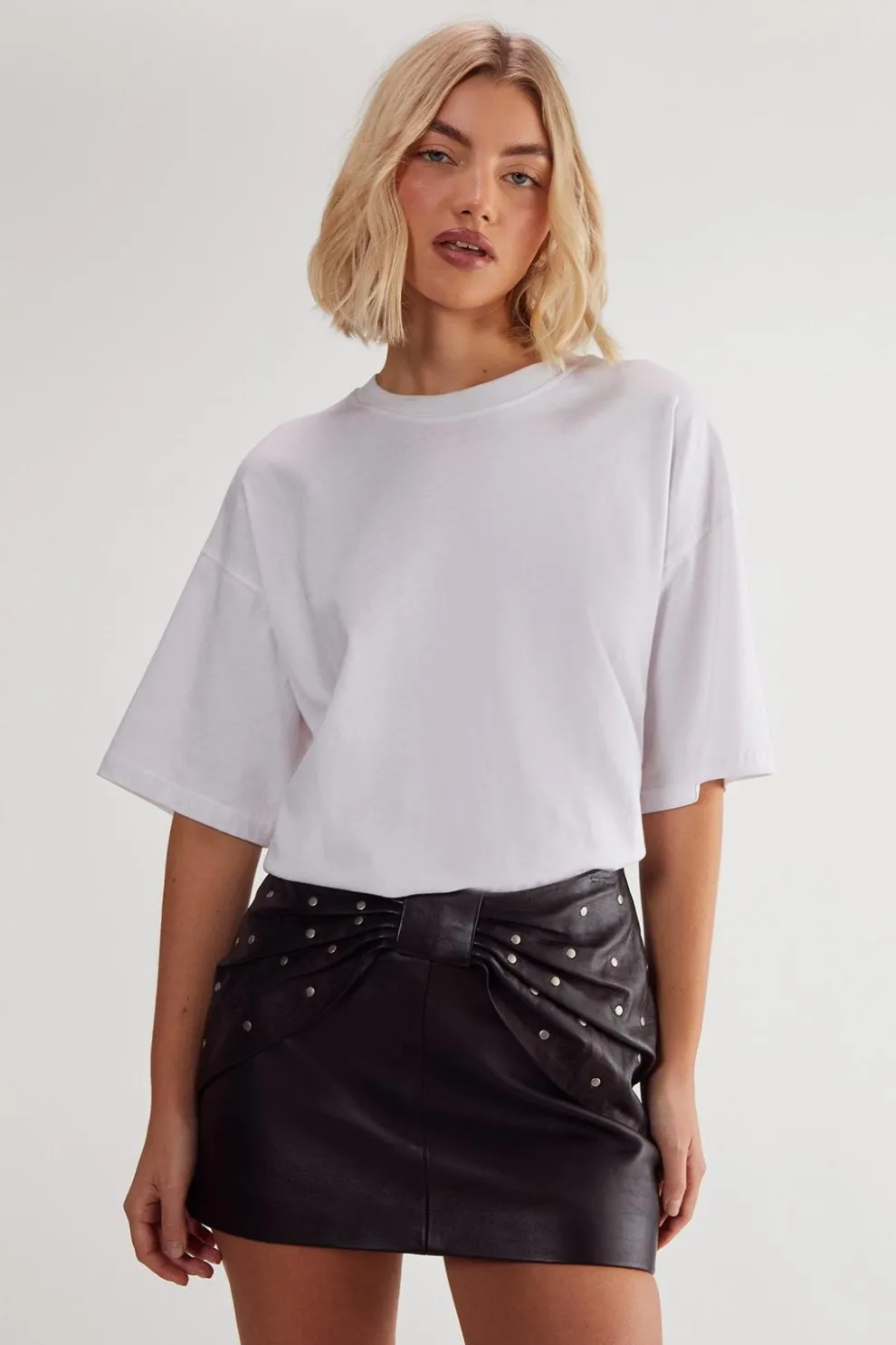 Studded Bow Detail Leather Mini Skirt | Nasty Gal