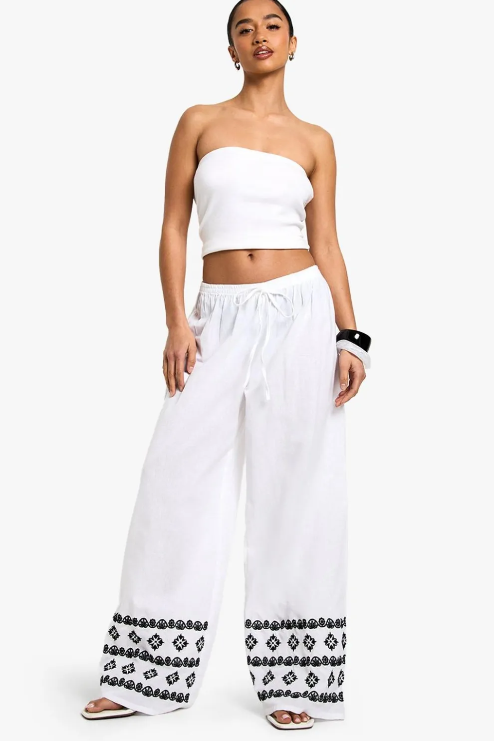 Petite Wide Leg Broderie Hem Trouser | Nasty Gal